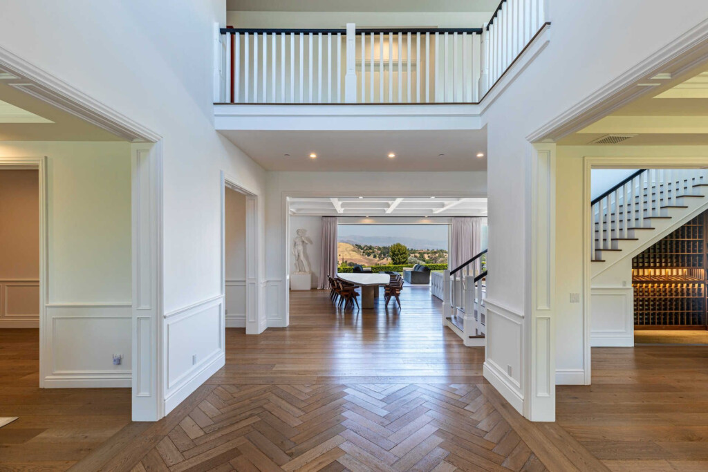 An Open Floor Plan With White Walls And Wood Floors - Scott Disick House Floor Plan